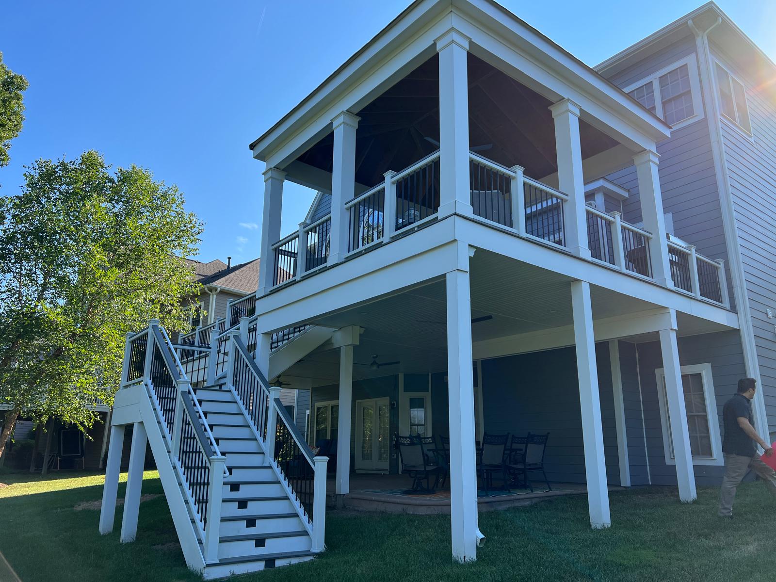 Multi-level composite deck with pergola in Fairfax County, VA