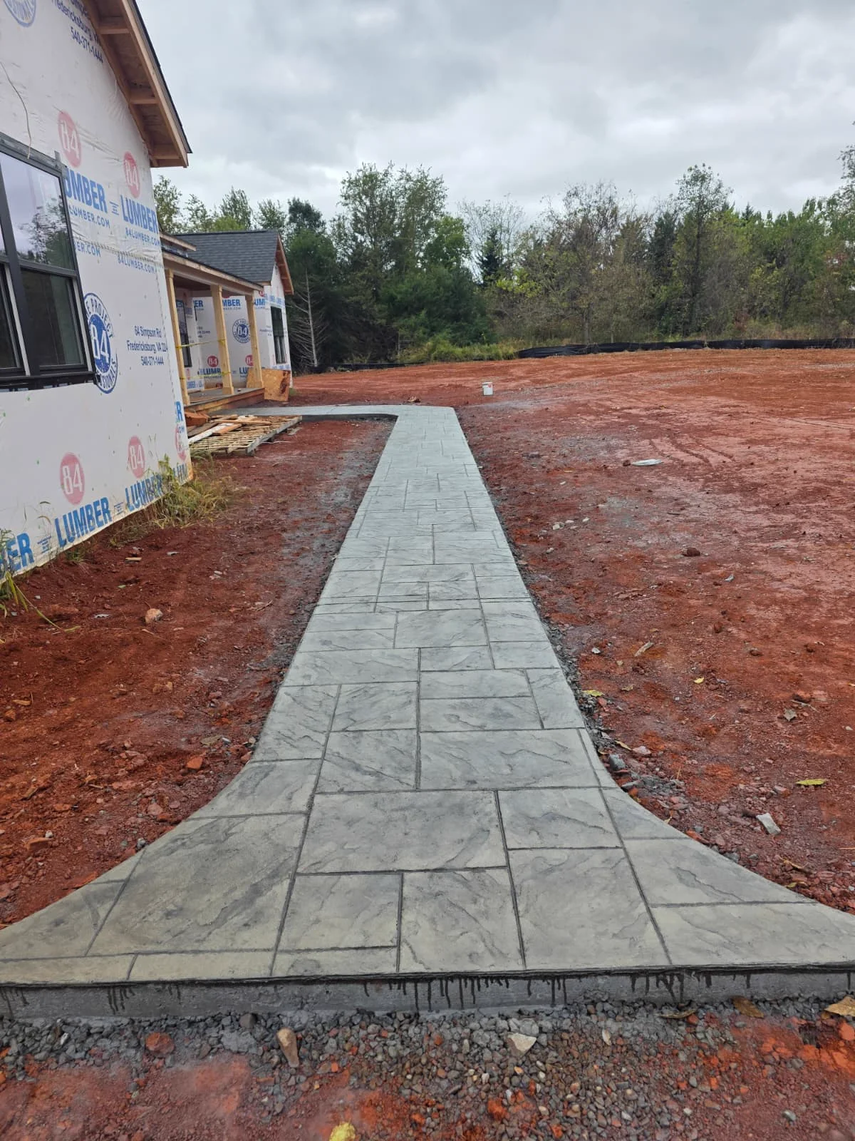 Stamped concrete patio and walkway in a Northern Virginia backyard