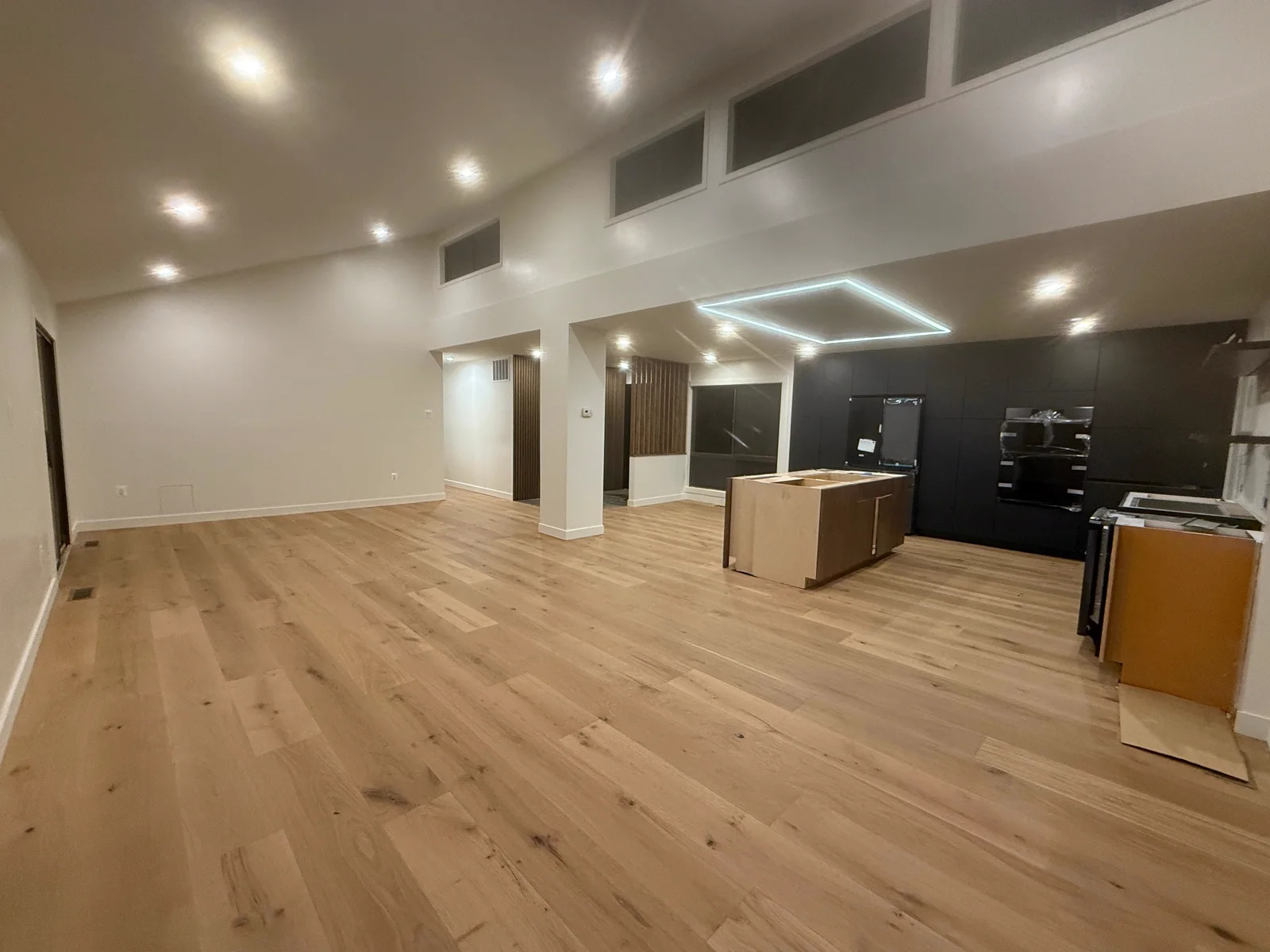 Open-concept home addition with new kitchen and hardwood floors in Northern Virginia