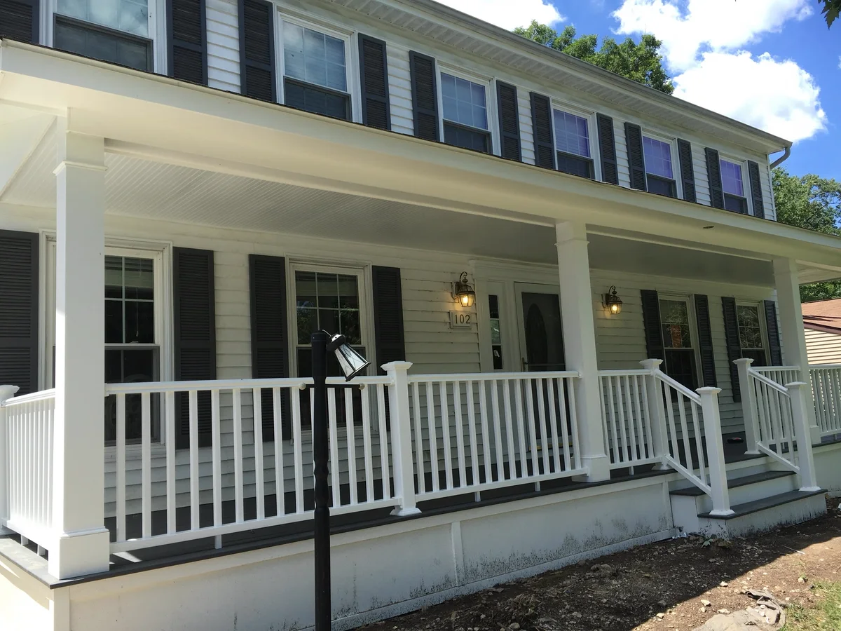 Finished exterior home addition with porch in Northern Virginia