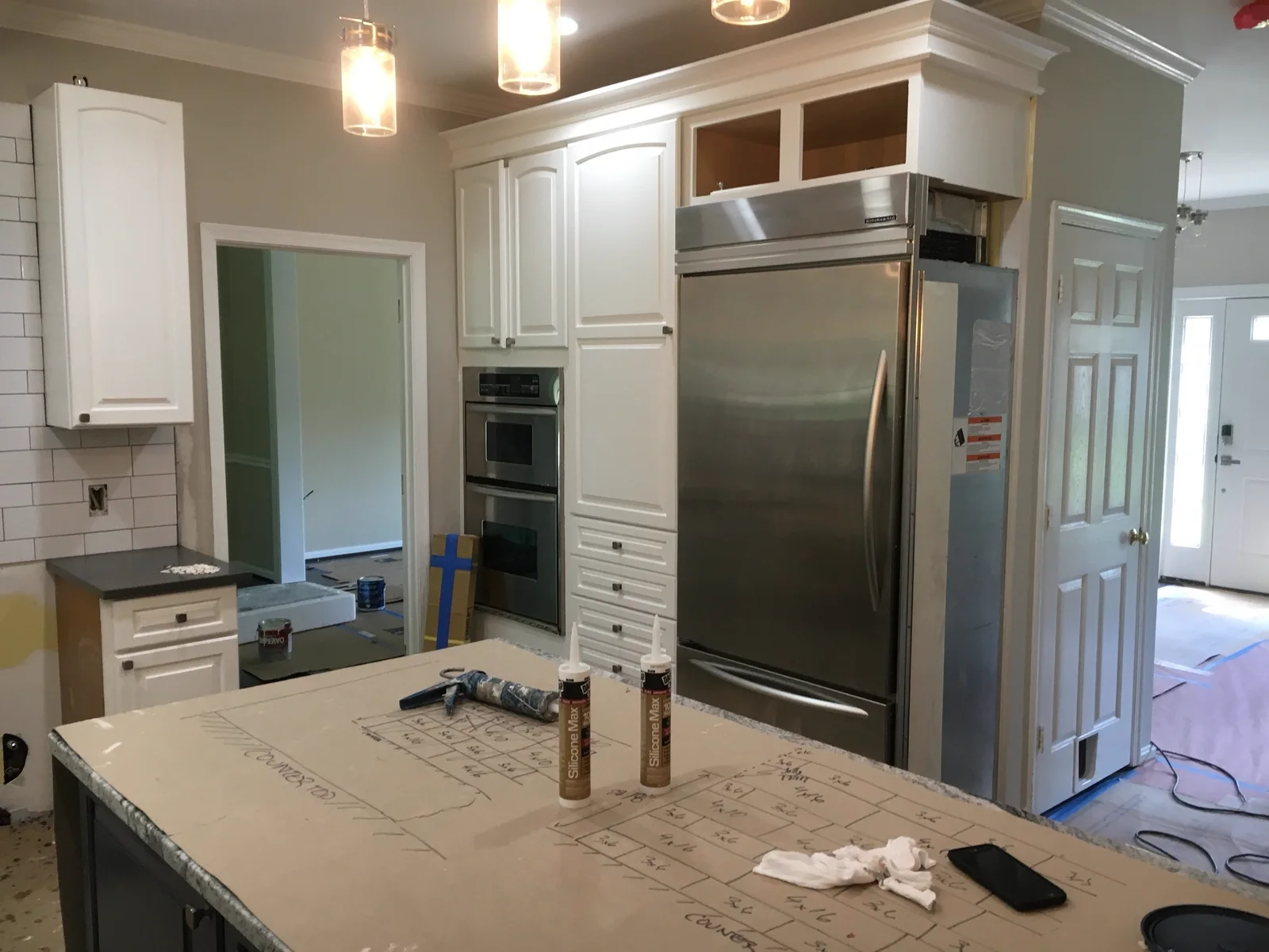 Kitchen remodel with quartz island and stainless appliances in Northern Virginia